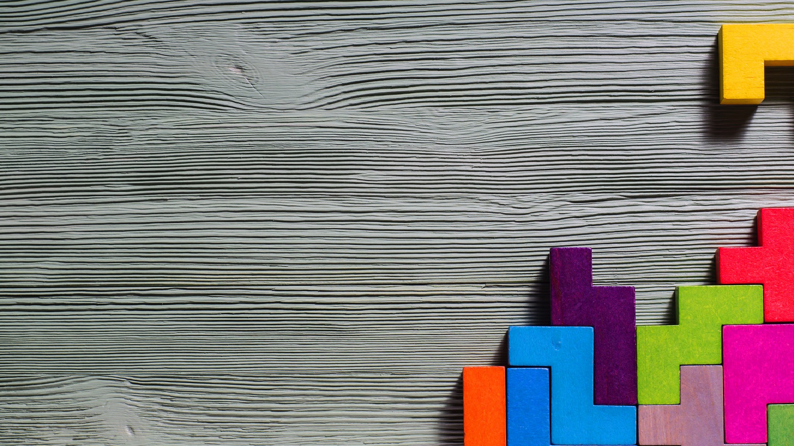 tetris blocks on wood background